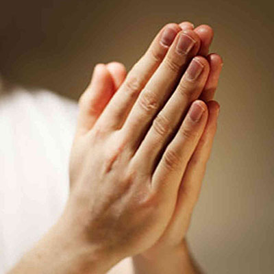 image of praying hands